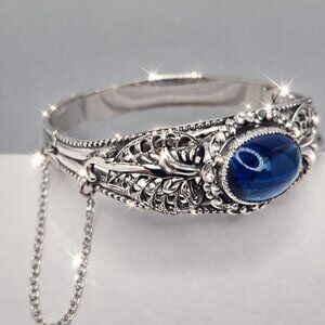 Vintage Filigree Silver Tone Bangle with Blue Cabochon